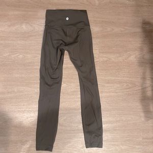 Army green lululemon leggings. Only worn once! Winder train times 27’.